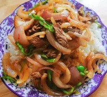 Onion Stir-Fry with Pork over Rice
