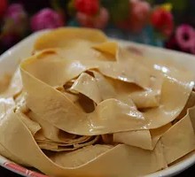 Oil-soaked tofu skin