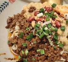 Signature Spicy Noodles with Peas and Pork