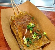 Fried Tofu Skin Wrapped with Pickled Radish and Minced Pork