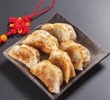 Sour Cabbage and Pork Pan-Fried Dumplings