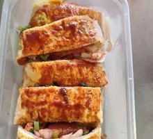 Grilled Sausage, Chicken Strips, Egg, and Grilled Noodles
