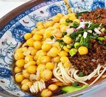 Special Broad Noodles with Pea and Pork Sauce