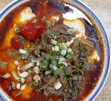 Tofu and Chicken Offal Noodles with Pickled Peppers