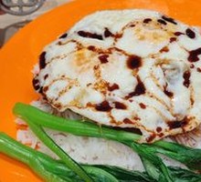 Signature Pork Chop with Two Eggs Fried Rice