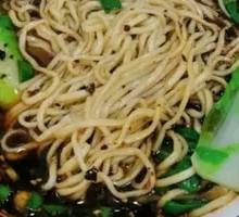 Signature Spicy Noodles with Peas and Pork
